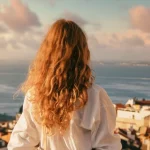 Lady looking out to see in Portugal