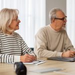 Man and woman with paperwork