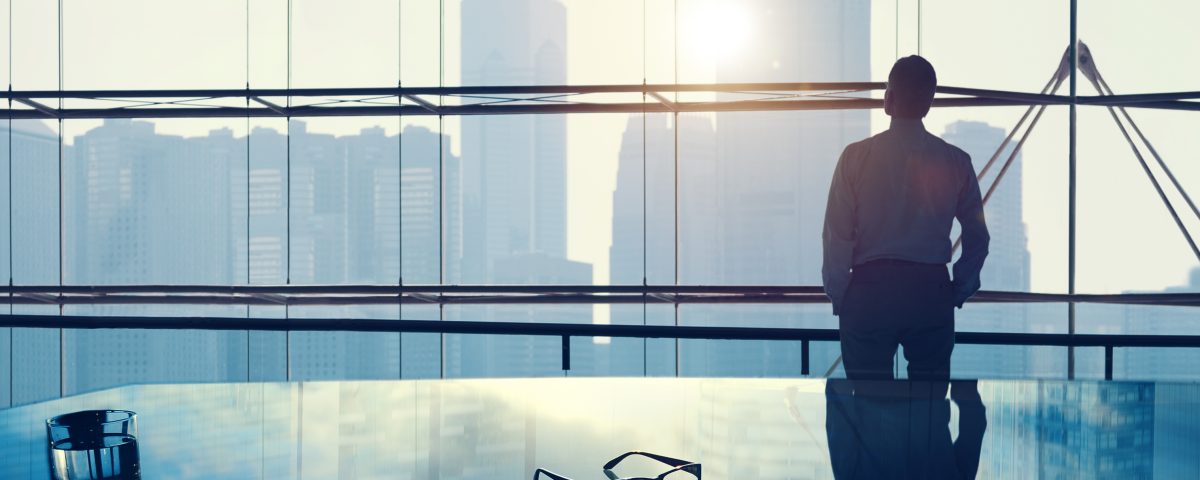 Businessman in a big office