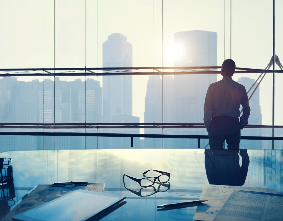 Businessman in a big office